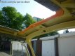 Joint/rembourrage en dessous du mécanisme de toit ouvrant